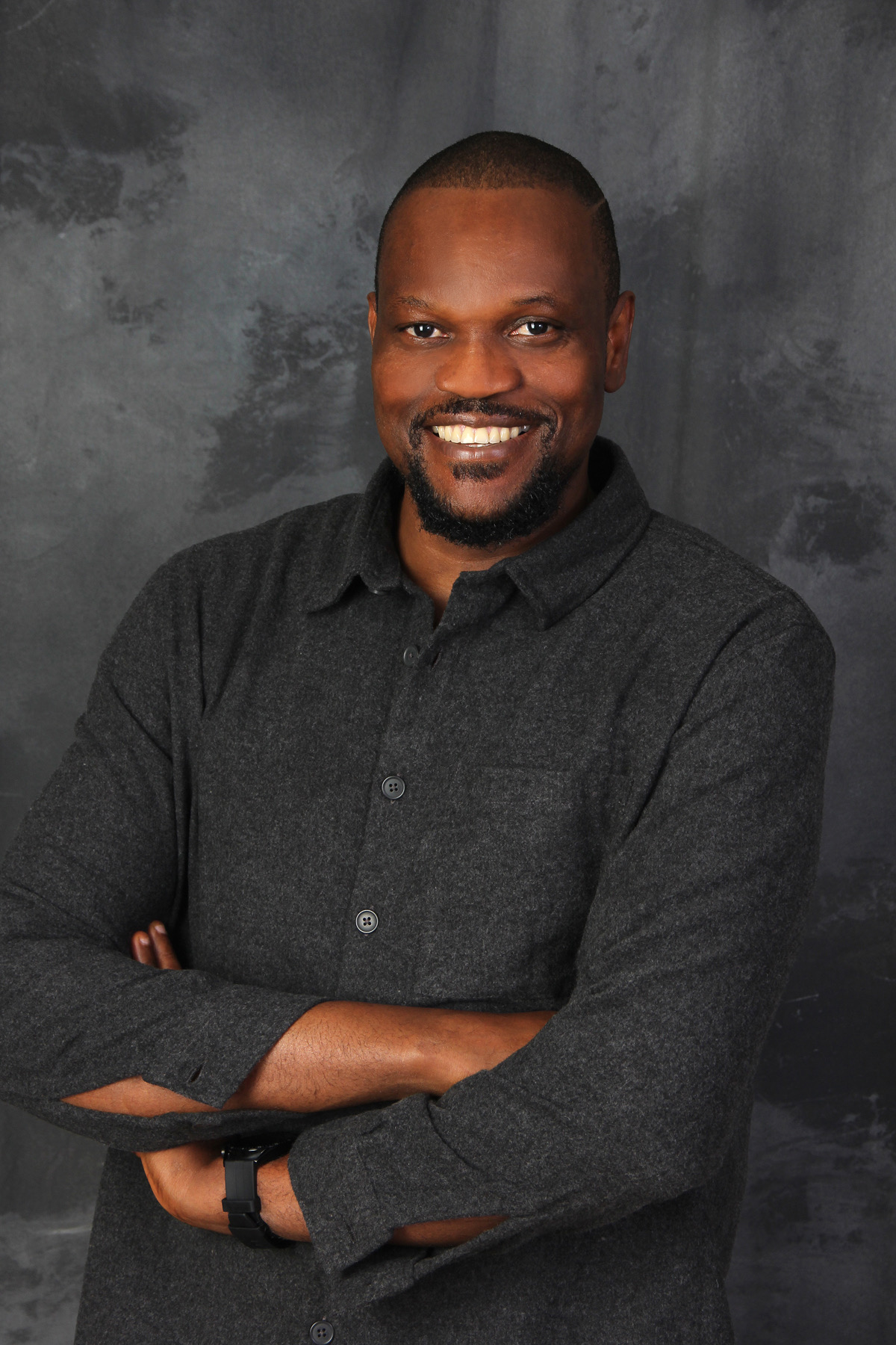 Portrait of Emeka in a snowy outdoor setting.